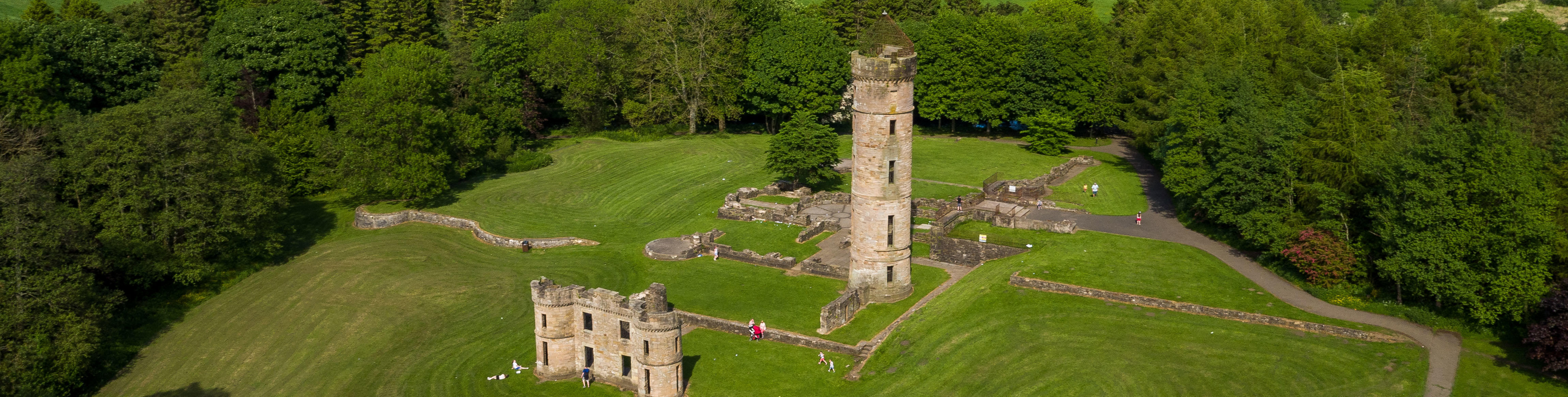 Eglinton Castle, Kilwinning Aerial view of Eglinton castle ruins surrounded by trees