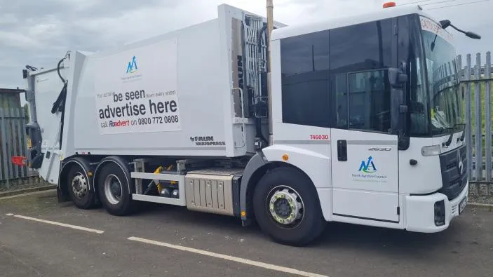 Parked North Ayrshire Council lorry with sign on the side highlighting advert space.