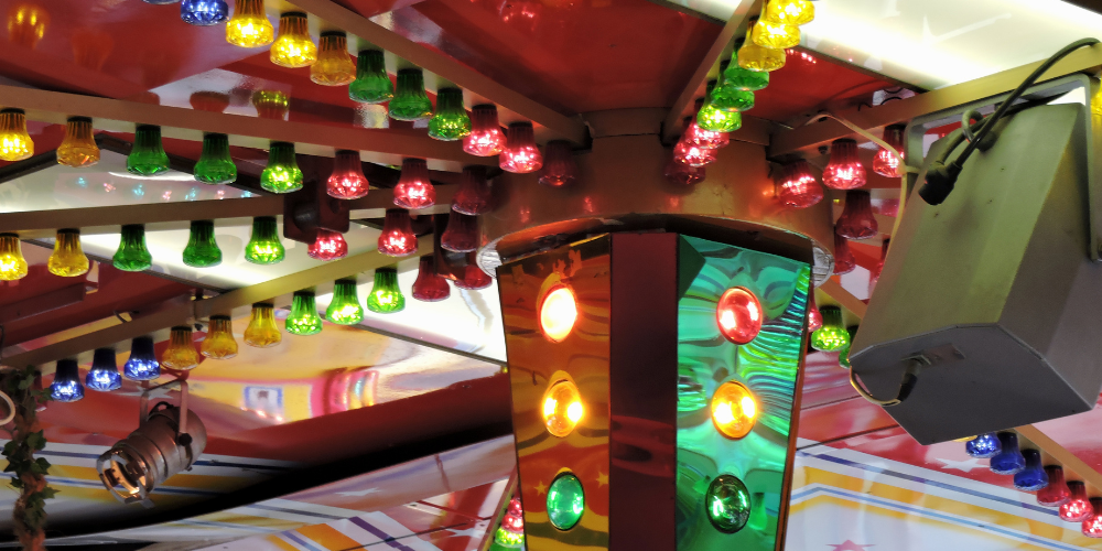 Close up of fairground ride lights