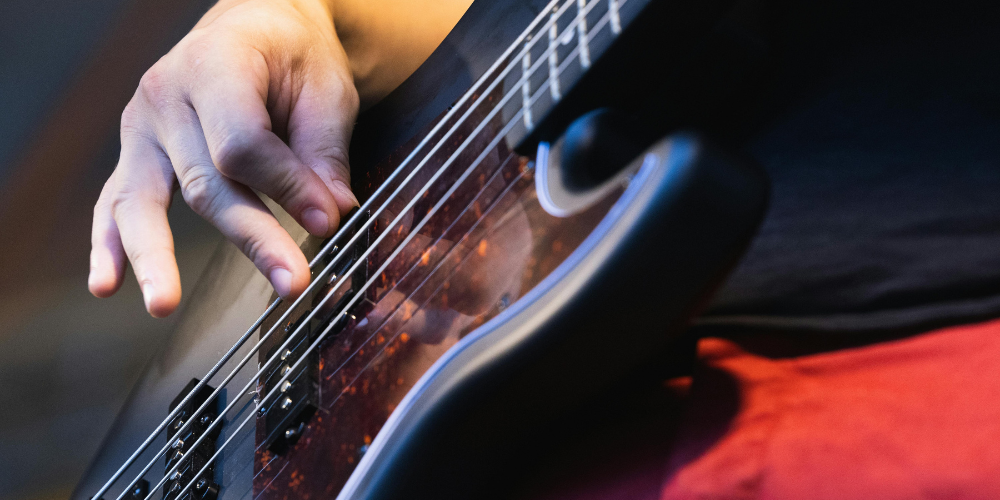 Hand of musician playing guitar